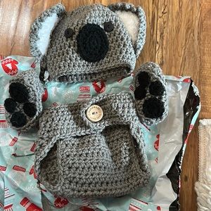 Newborn koala outfit. Never worn. Complete with hat, booties and diaper cover.